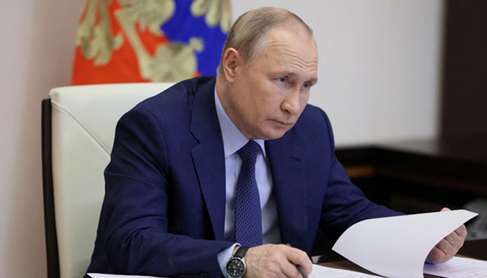 Russian President Vladimir Putin attends a meeting on the road construction development via video link at the Novo-Ogaryovo state residence outside Moscow, Russia June 2, 2022.—Reuters