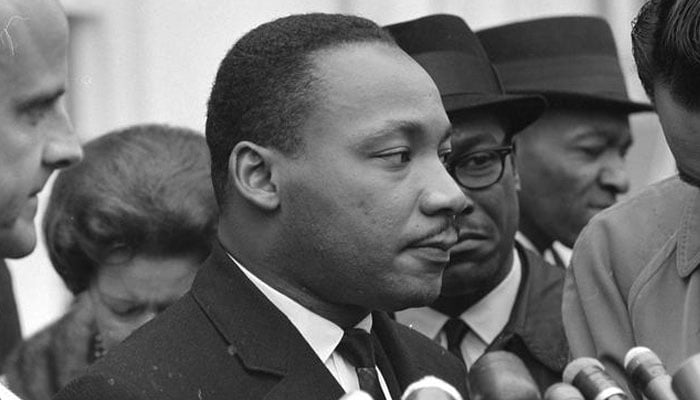 Martin Luther King Jr. speaks after meeting with President Lyndon B. Johnson to discuss civil rights at the White House in Washington, December 3, 1963. —Reuters