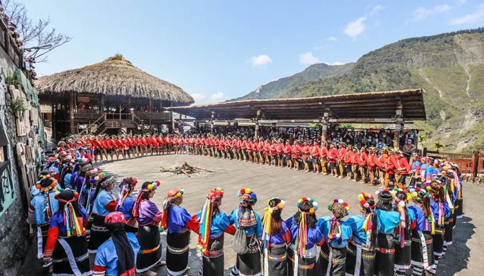 This picture shows Tsou people gathered for the Mayasvi festival. — BBC
