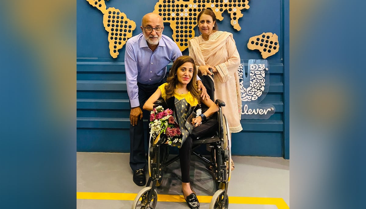 Aman Raheel is seen here with her parents. — Instagram/@the.girlwith.wings