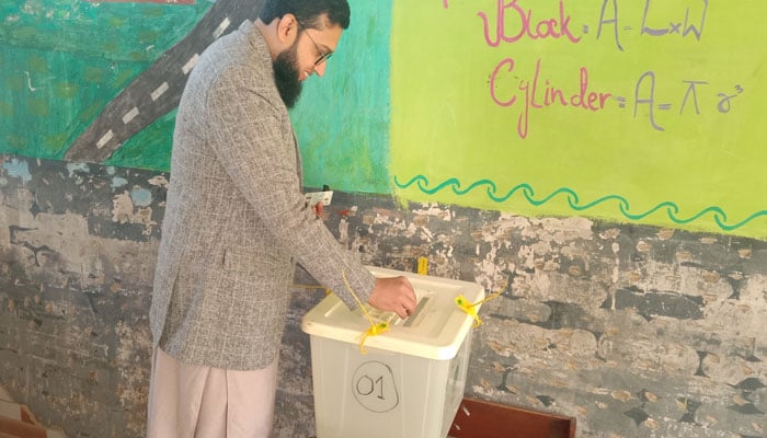 This undated picture shows a person casting his vote in Karachi, Pakistan. — Geo.tv