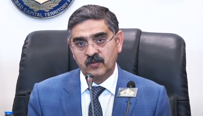 Caretaker Prime Minister Anwaar-ul-Haq Kakar speaks in Islamabad, on December 11, 2023, in this still taken from a video. — YouTube/GeoNewsLive