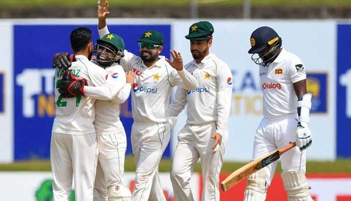 Pakistan players celebrate after taking a wicket during match against Sri Lanka — AFP/File