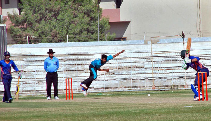 A view of cricket match between HBL and SSGC at Niaz Stadium in Hyderabad. — APP/File
