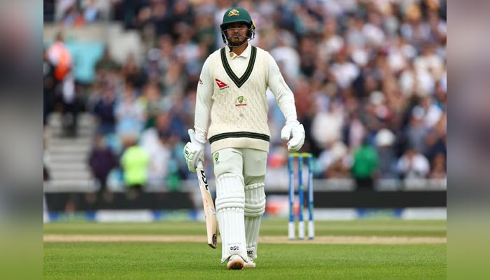 Australia's Usman Khawaja walks after losing his wicket, bowled lbw by England's Chris Woakes at The Oval, London, Britain on July 31, 2023. — Reuters