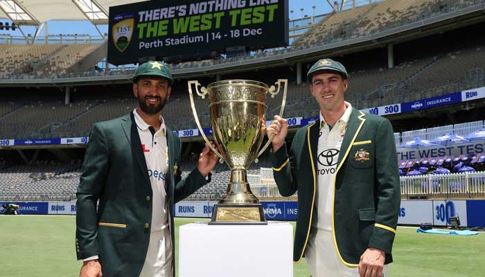 Pakistan captain Shan Masood (left) with Australias captain Pat Cummins. — PCB