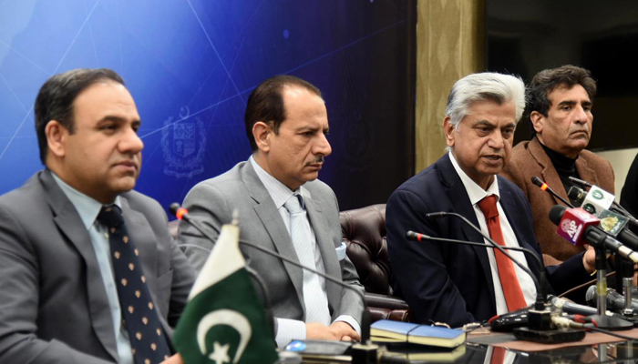 Caretaker Federal Minister for Information and Broadcasting Murtaza Solangi (second right) addressing a press conference in Islamabad, on December 13, 2023. — PID
