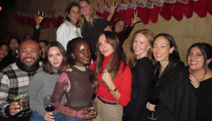 Victoria Beckham (centre) at her Christmas party in New York, US, on December 13, 2023. — Instagram/@victoriabeckham