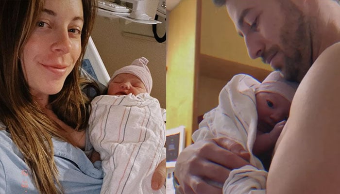Ashley Wagner and Alex Clark holding their newborn baby girl. — Instagram/@ashleywagner