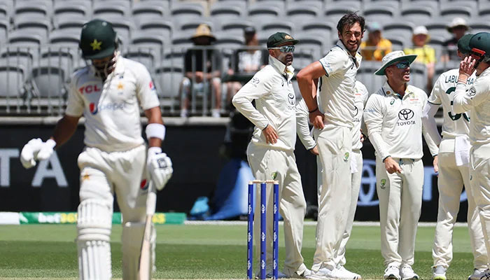 Abdullah Shafique walks back to pavilion during Perth Test against Australia. — AFP