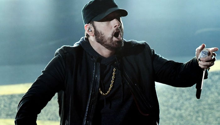 Eminem gets behind mic to rap about addiction past