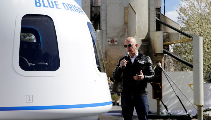 Amazon and Blue Origin founder Jeff Bezos addresses the media about the New Shepard rocket booster and Crew Capsule mockup at the 33rd Space Symposium in Colorado Springs, Colorado, United States April 5, 2017.—Reuters
