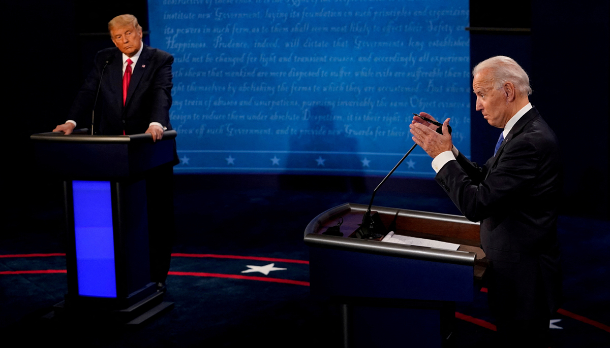 President Joe Biden answers a question as former president Donald Trump listens during the second and final presidential debate at the Curb Event Center at Belmont University in Nashville, Tennessee, US, October 22, 2020. — Reuters