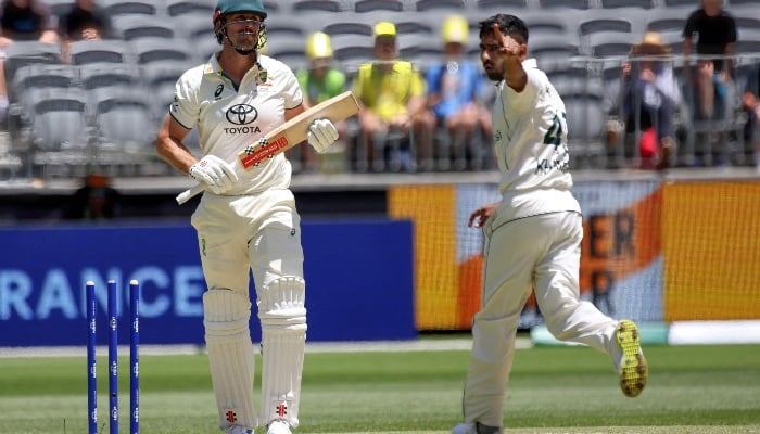 Australia’s Mitchell Marsh (L) is bowled by Pakistan´s Khurram Shahzad (R) on the second day of the first Test cricket match between Australia and Pakistan in Perth on December 15, 2023. —AFP
