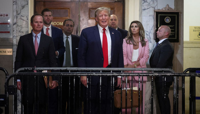 Former US President Donald Trump speaks as he attends the Trump Organization civil fraud trial, in New York State Supreme Court in the Manhattan borough of New York City, US, December 7, 2023. —