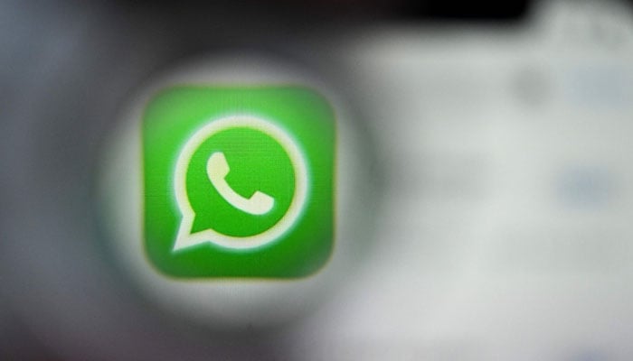 This illustration photograph taken on December 22, 2023, shows the logo of US instant messaging software Whatsapp displayed on a smartphone´s screen, in Frankfurt am Main, western Germany. — AFP