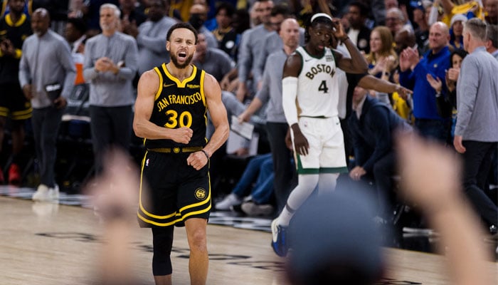 Golden State Warriors guard Stephen Curry (30) reacts after scoring against the Boston Celtics during the overtime period at Chase Center on December 19, 2023 in San Francisco, California, US. — Reuters