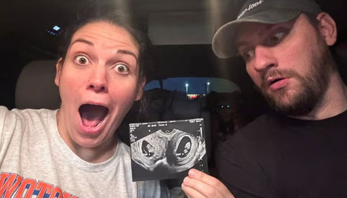 Kelsey Hatcher and her husband Caleb. Only 0.3% of women have a double uterus. — AFP