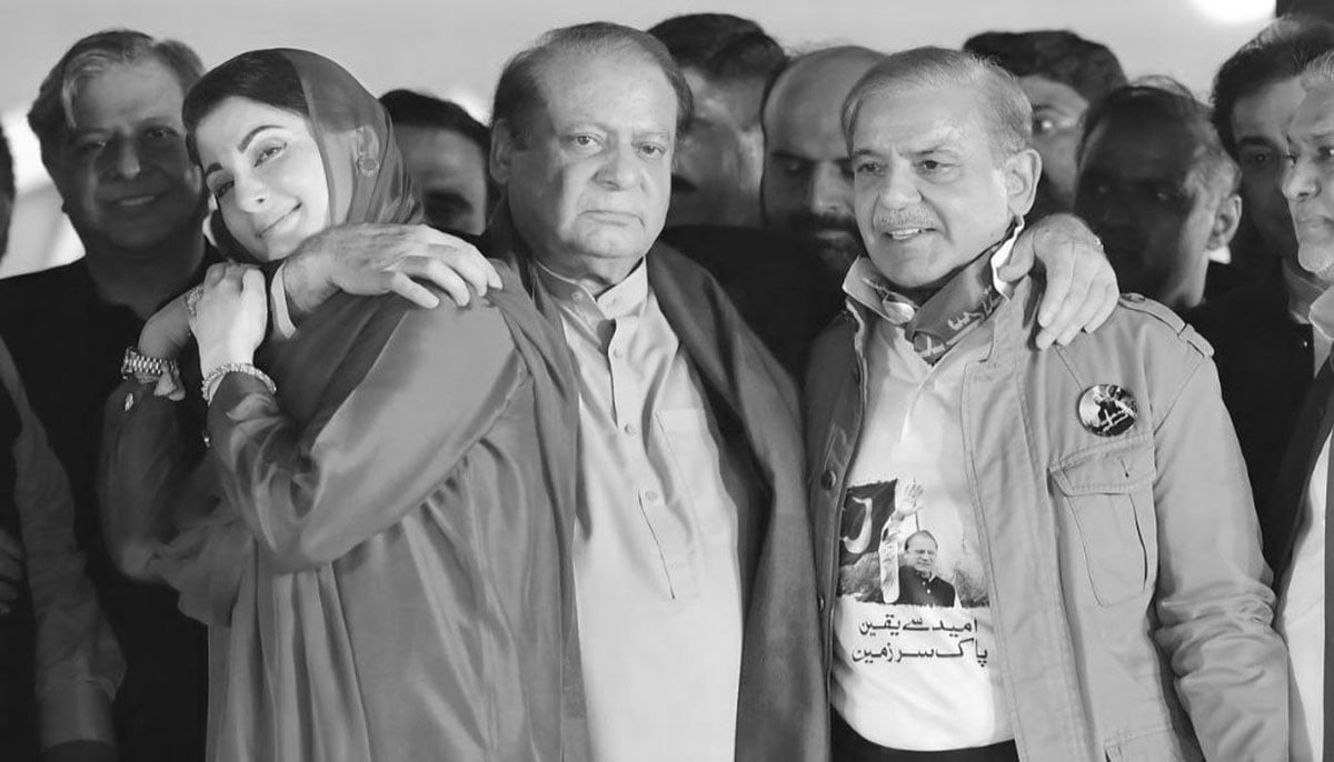 (L to R) PML-N leaders Maryam Nawaz, Nawaz Sharif and Shehbaz Sharif at the stage during a rally at Minar-e-Pakistan in Lahore, on October 21, 2023, in this still taken from a video. — X@pmln_org