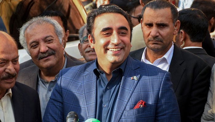 Pakistan Peoples´ Party (PPP) chairman Bilawal Bhutto Zardari (C) speaks to media after submitting his nomination papers to a returning officer in Larkana of Sindh province on December 24, 2023, ahead of the upcoming 2024 general elections. — AFP