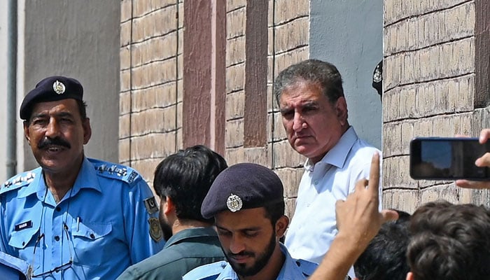 Shah Mahmood Qureshi, Vice Chairman of Pakistan Tehreek-e-Insaf (PTI) party and Pakistan´s former Foreign Affairs Minister is seen outside a special court after he was granted a four-day physical remand in Islamabad on August 21, 2023. — AFP