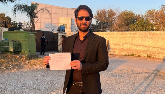 Hamza Haroon pictured with his nomination papers. — Author