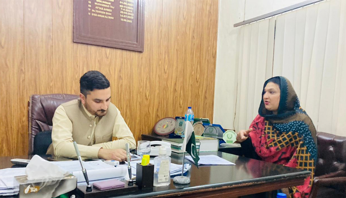 Sobia Khan files for her nomination at the ECP in Peshawar. — Photo via reporter