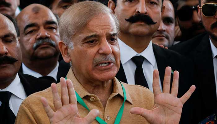 Former Punjab chief minister Shehbaz Sherif gestures as he speaks to the media at the Supreme Court of Pakistan in Islamabad, Pakistan April 7, 2022. — Reuters
