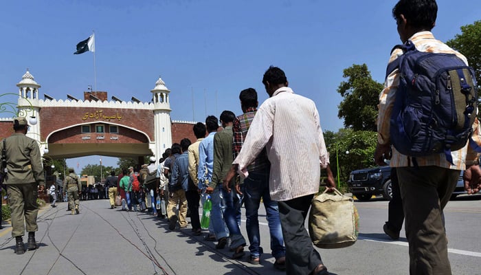 Freed Indian fishermen arrive at the Wagah border, Lahore, in 2014. — AFP