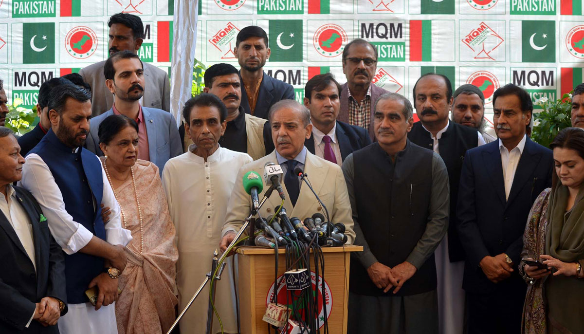 PML-N President Shehbaz Sharif (centre) speaks at the MQM-P headquarters in Karachi during a visit on December 29, 2023. — PPI