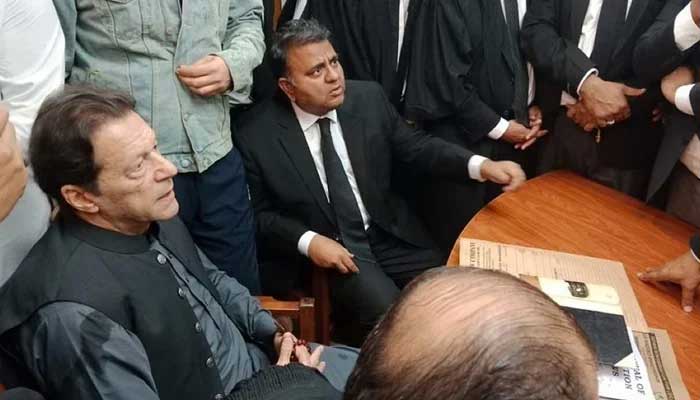 Pakistan Tehreek-e-Insaf founder Imran Khan (L) and former federal minister Fawad Chaudhry in a court in Islamabad on March 24, 2023. — Facebook/Chaudhry Fawad Hussain