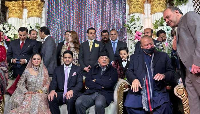 PML-N supremo Nawaz Sharif (right) and party president Shehbaz Sharif (centre) attend a wedding ceremony in Lahore on December 3, 2024. — Reporter