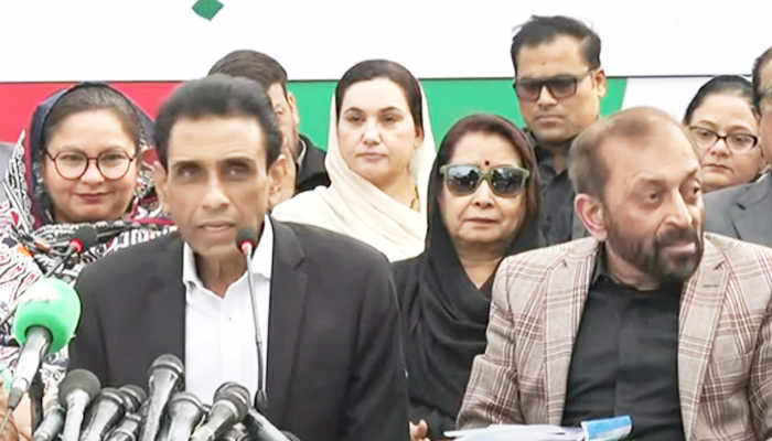 Muttahida Qaumi Movement-Pakistan Convener Dr Khalid Maqbool Siddiqui (left) and Senior Deputy Convener Dr Farooq Sattar announce the partys manifesto during a press conference in Karachi on January 4, 2024, in this still taken from a video. — YouTube/PTV News