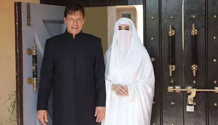 Former prime minister Imran Khan with his wife Bushra Bibi. — X/@PTIofficial/File