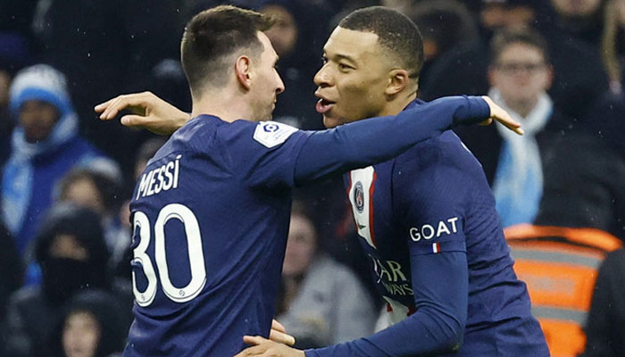 Paris St Germain’s Kylian Mbappe celebrates scoring their third goal with Lionel Messi against Olympique de Marseille on February 26, 2023. — Reuters