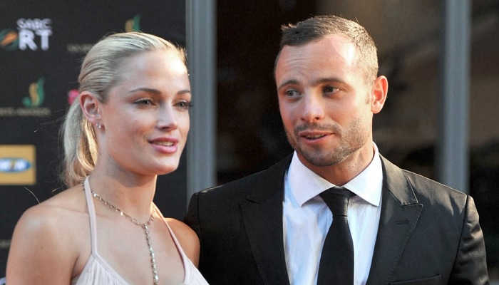 Paralympian Oscar Pistorius looks at and girlfriend Reeva Steenkamp at an event in this undated picture — File/AFP