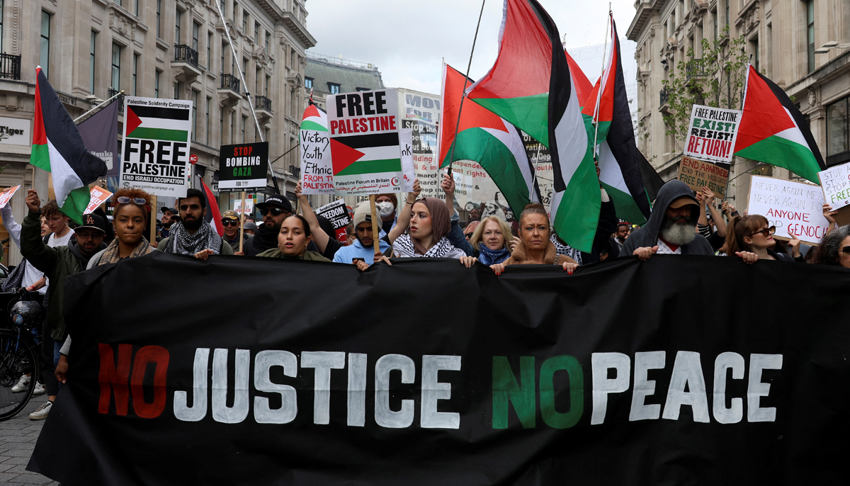 Demonstrators protest in solidarity with Palestinians, amid the ongoing conflict between Israel and the Palestinian group Hamas, in London, Britain, October 14, 2023. — Reuters