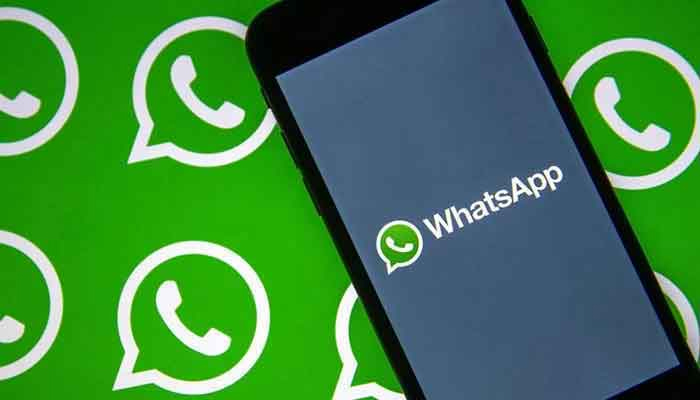 This representational image shows WhatsApp logo on a smartphone. — AFP