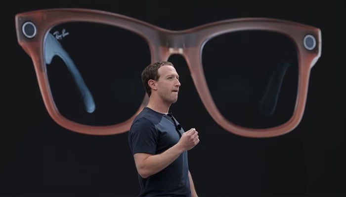 Meta CEO Mark Zuckerberg delivers a speech, as a pair of Ray-Ban smart glasses appear on screen, during the Meta Connect event at the companys headquarters in Menlo Park, California.—Reuters