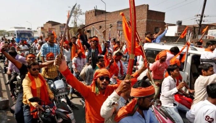 Hindu Yuva Vahini vigilante members take part in a rally in the Indian city of Unnao on April 5, 2017. — Reuters