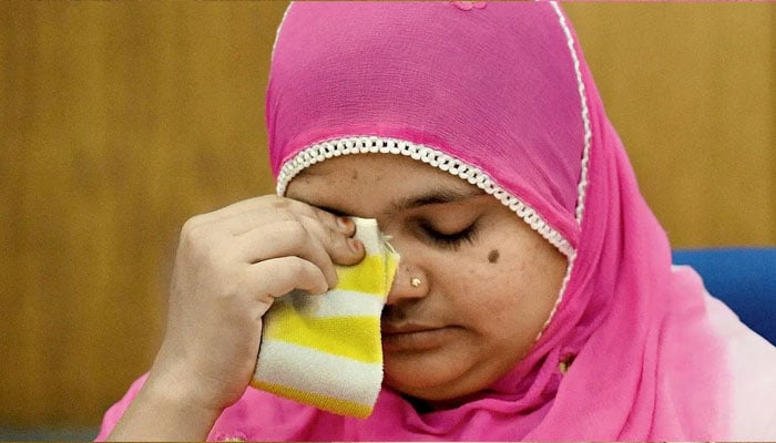 Bilkis Bano reacts during a press conference in New Delhi on May 8, 2017. — AFP