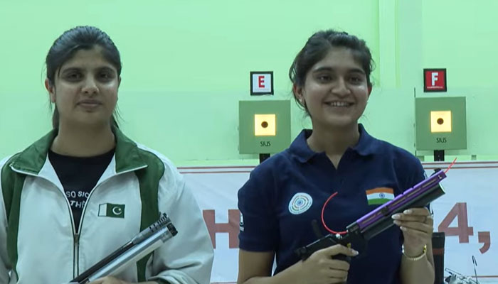 Pakistani shooter Kishmala Talat (left) scores 575 points in the initial round. — Reporter