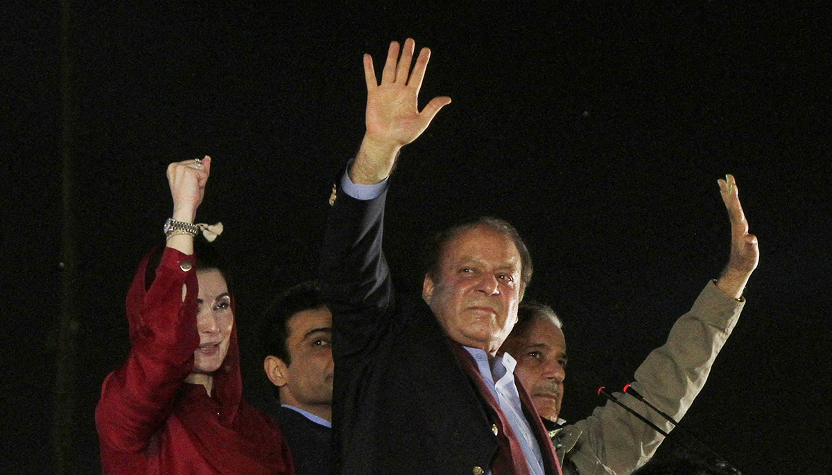 Former prime minister Nawaz Sharif gestures to supporters upon his arrival from a self-imposed exile in London, ahead of the 2024 Pakistani general election, in Lahore, on October 21, 2023. — Reuters