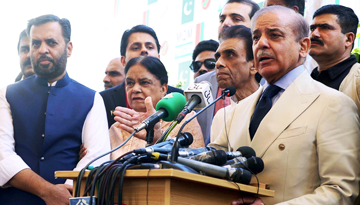 Shehbaz Sharif (center), leader of Pakistan Muslim League Nawaz (PML-N), addresses the media after a meeting with Muttahida Qaumi Movement-Pakistan (MQM-P) party leaders ahead of the upcoming 2024 general elections at latters headquater in Karachi, on December 29, 2023. — Online