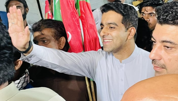 Barrister Abdullah Mumtaz Kahloon waves to Pakistan Tehreek-e-Insaf (PTI) supporters in this undated photo. — Facebook/AMKahloon