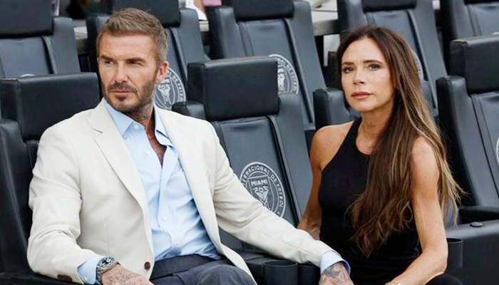 Football legend David Beckham (left) and his wife Victoria Beckham. — Reuters