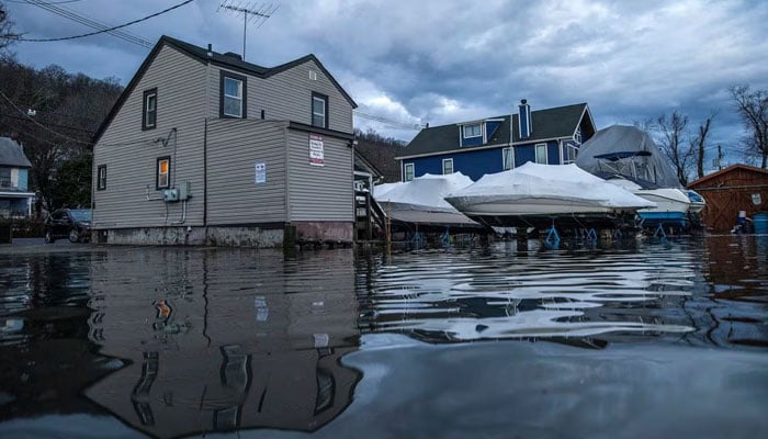 Water rises at a residential area in the aftermath of a storm in Piermont, New York, U.S., January 10, 2024. — Reuters