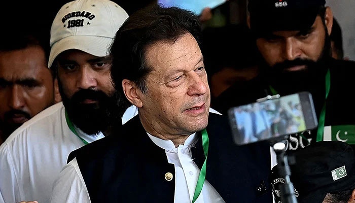 Former PTI chairman Imran Khan coming out of a court in Islamabad. — AFP/File