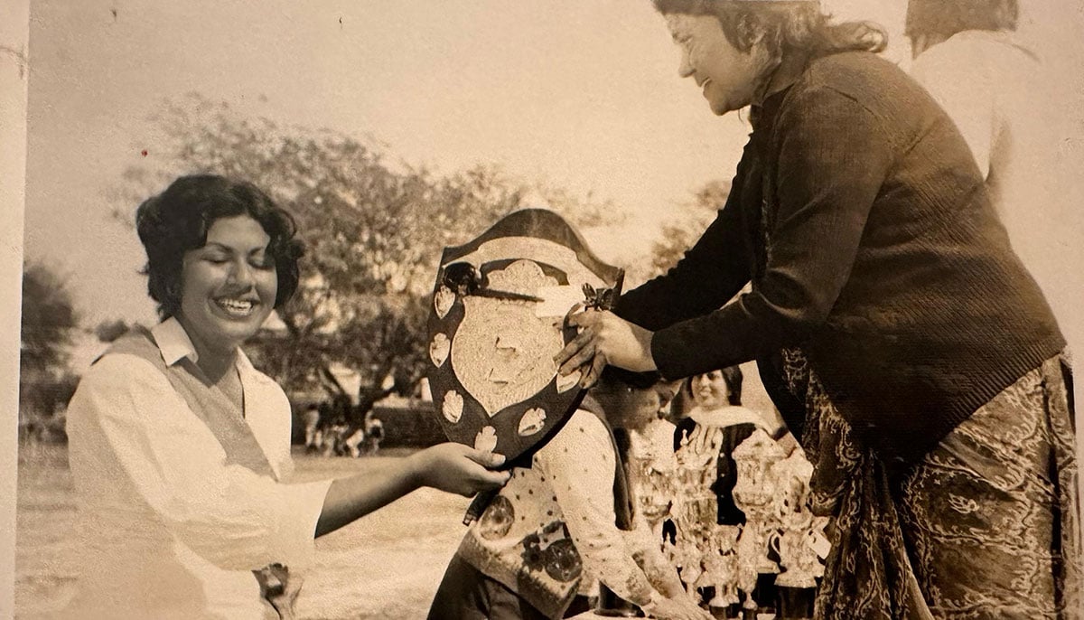 Afshan Saeed receiving trophies and shields for winning various sporting events at her college during 1974-1975. — Photo by author