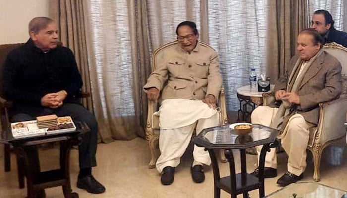 PML-Q President Chaudhry Shujaat exchanges views with PML-N supremo Nawaz Sharif, President Shehbaz Sharif during a meeting to discuss electoral alliance and seat adjustments on Gujrat seats, in Lahore on Wednesday, December 6, 2023. — PPI